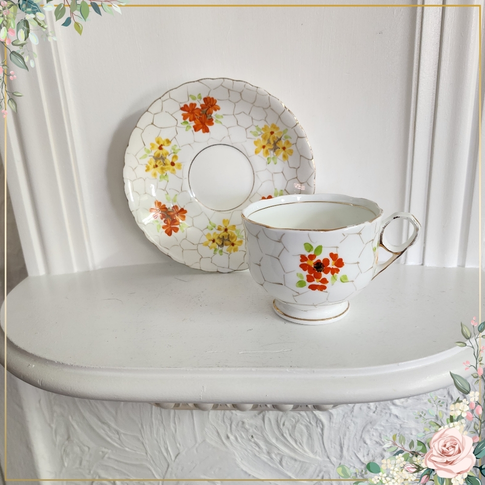 Vintage Tea Cup and Saucer by Phoenix China With Hand Painted 